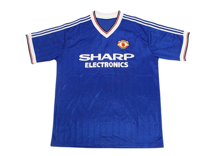 Camiseta de la tercera equipación del Manchester United 1982/84