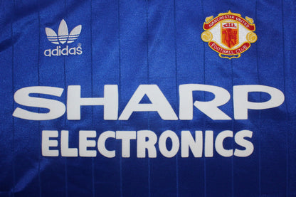 Camiseta de la tercera equipación del Manchester United 1982/84